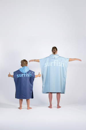 Mother and son from the back with Surfish backprint ponchos