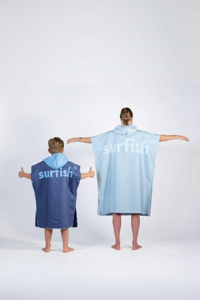 Mother and son from the back with Surfish backprint ponchos